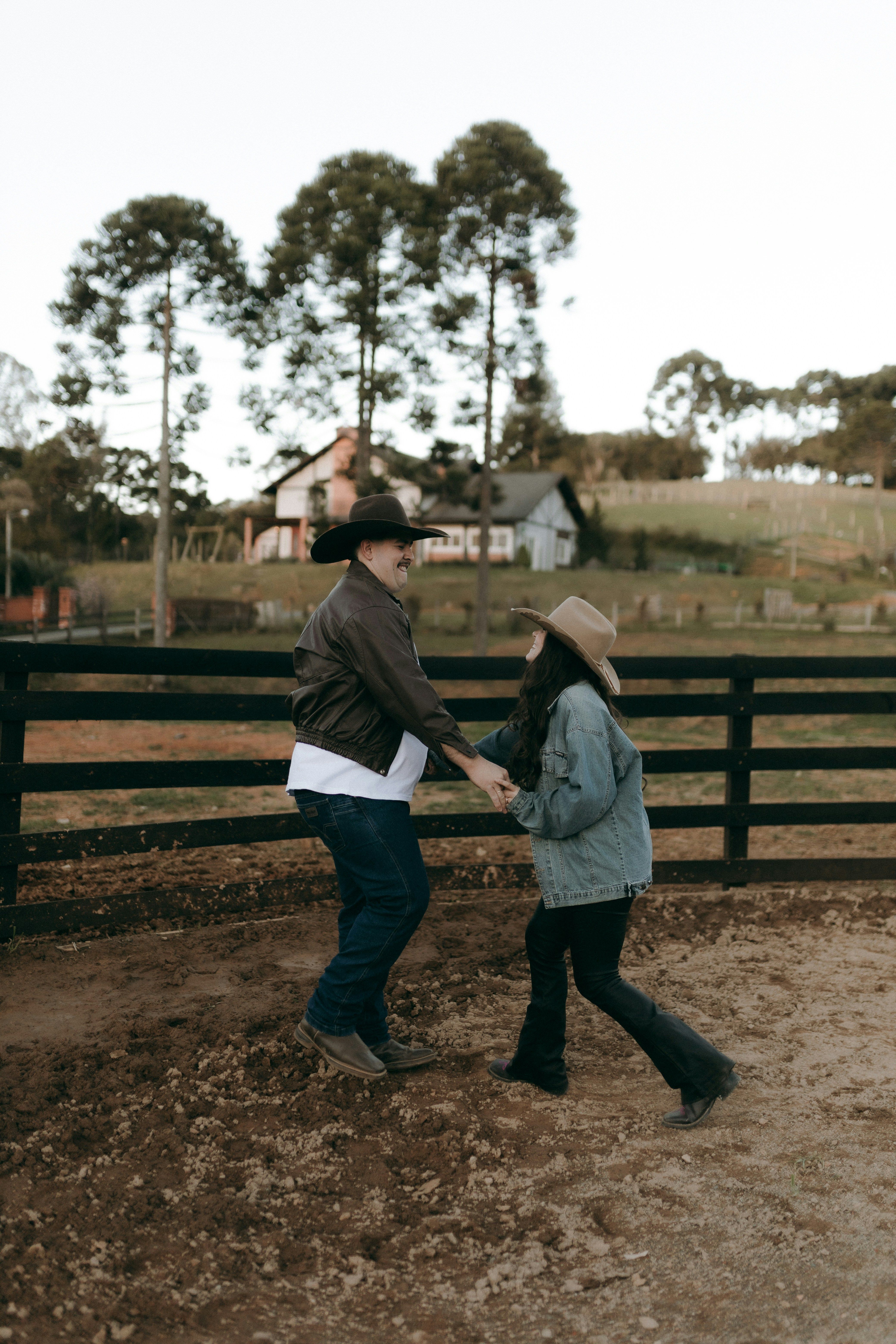 Couple dancing outdoors on a ranch
